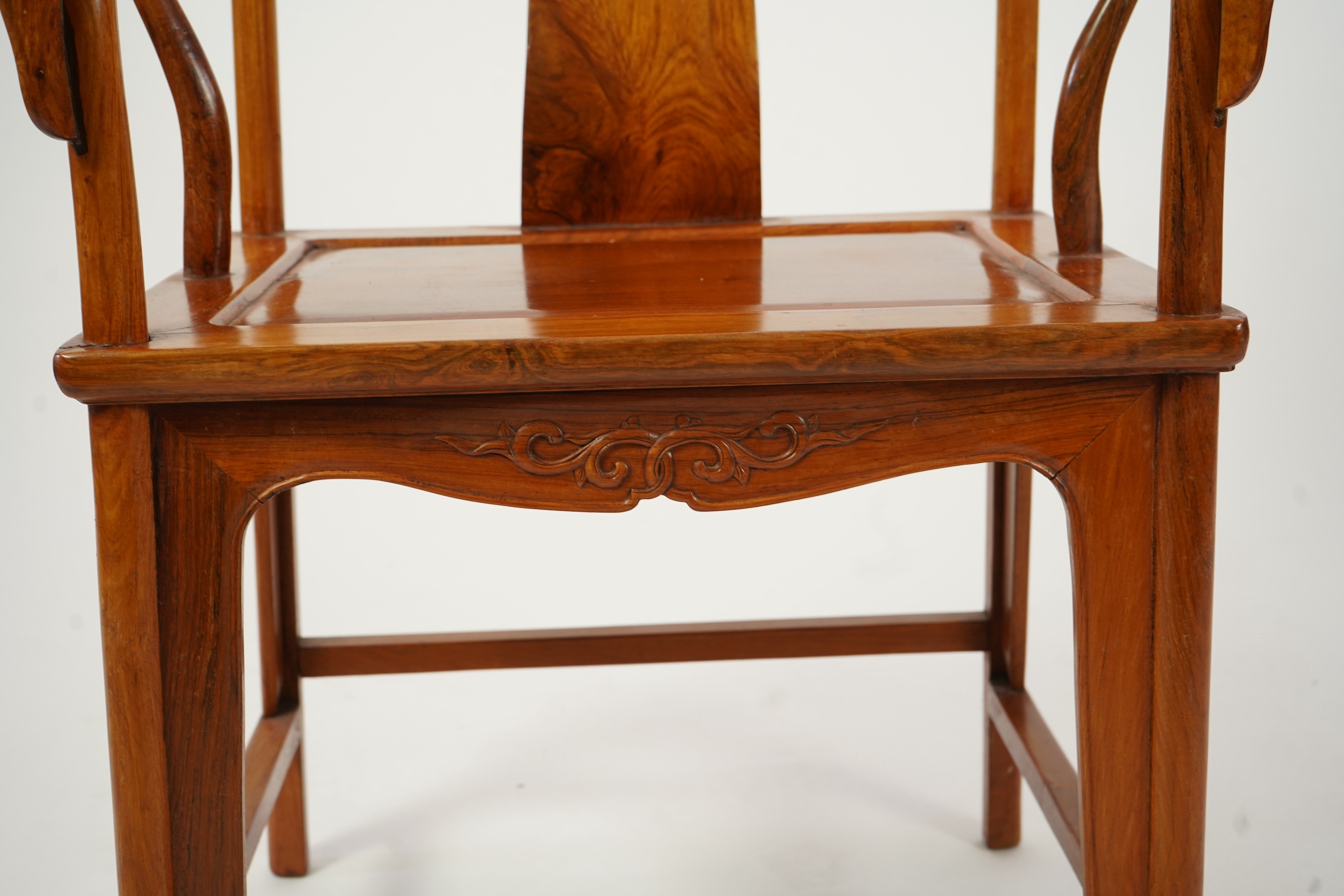 A Chinese huanghuali and brass mounted horseshoe-back armchair, quanyi, late 19th century